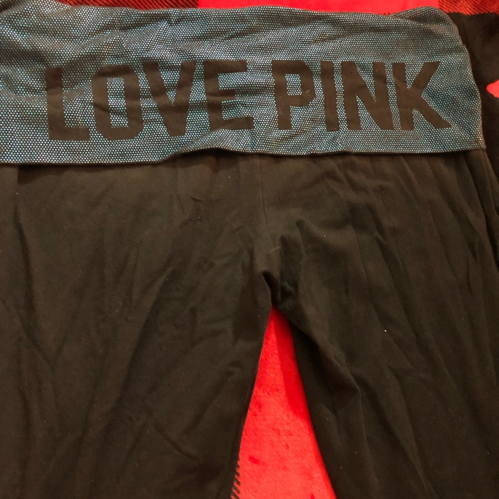 Pink bootcut leggings in a size medium